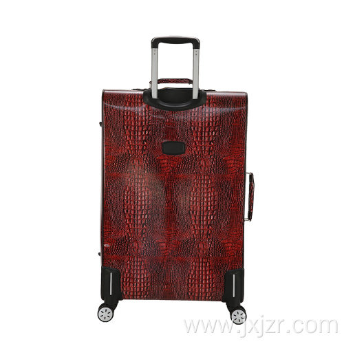 Imitated snake skin luggage